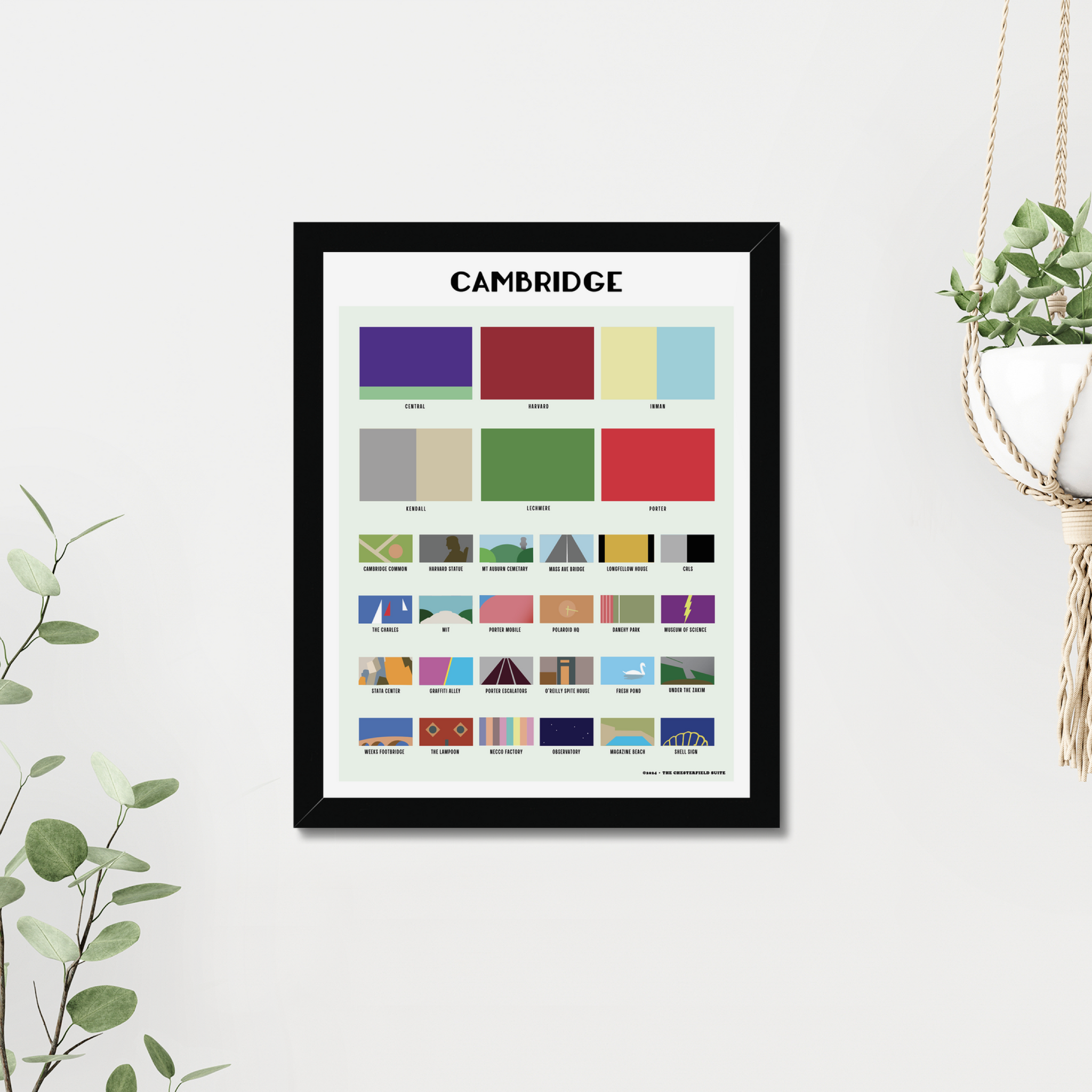 design of cambridge ma with blocks of color respresenting each neighborhood and attraction in a frame on a wall