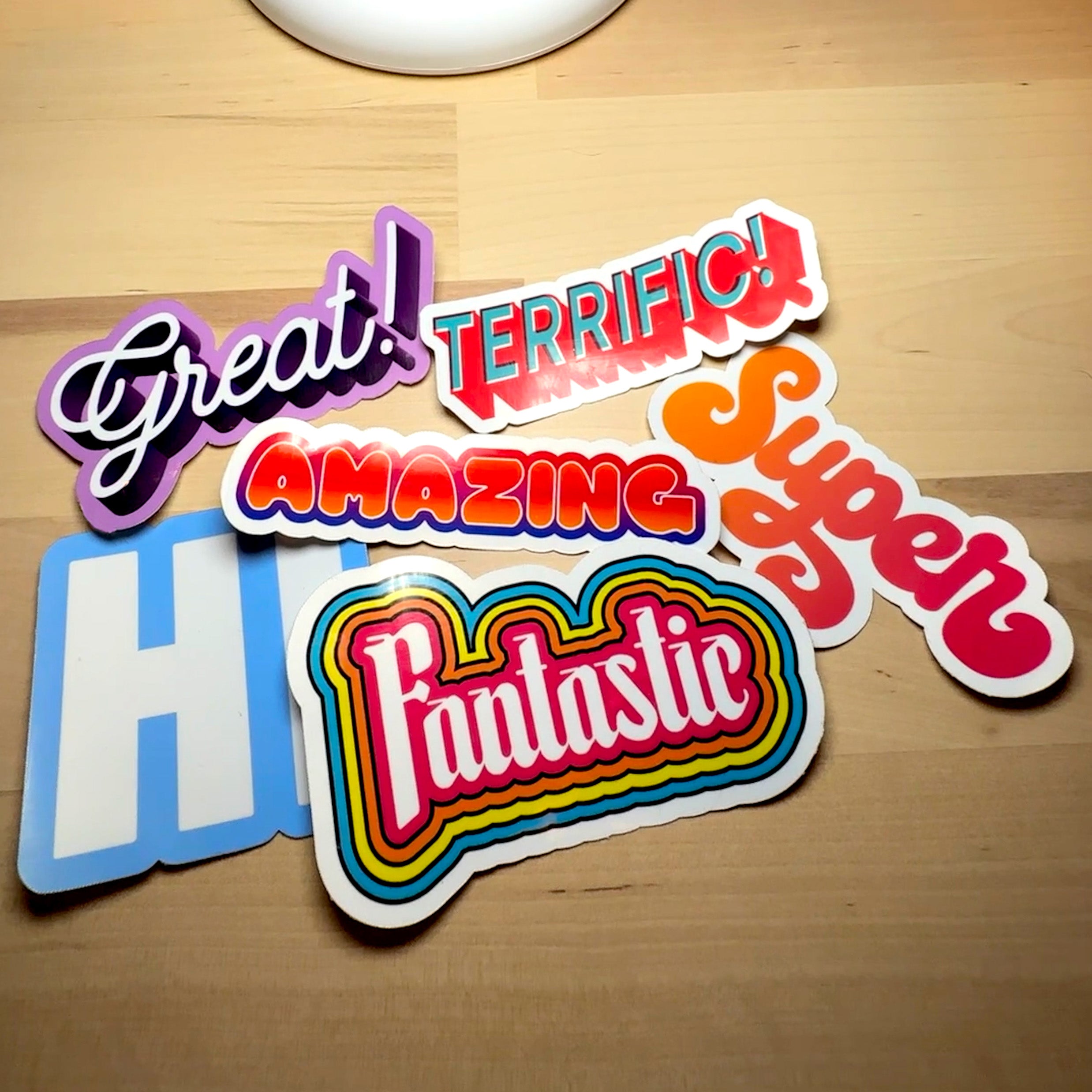 photograph of 6 positivity stickers great, terrific, amazing, hi, fantastic and super