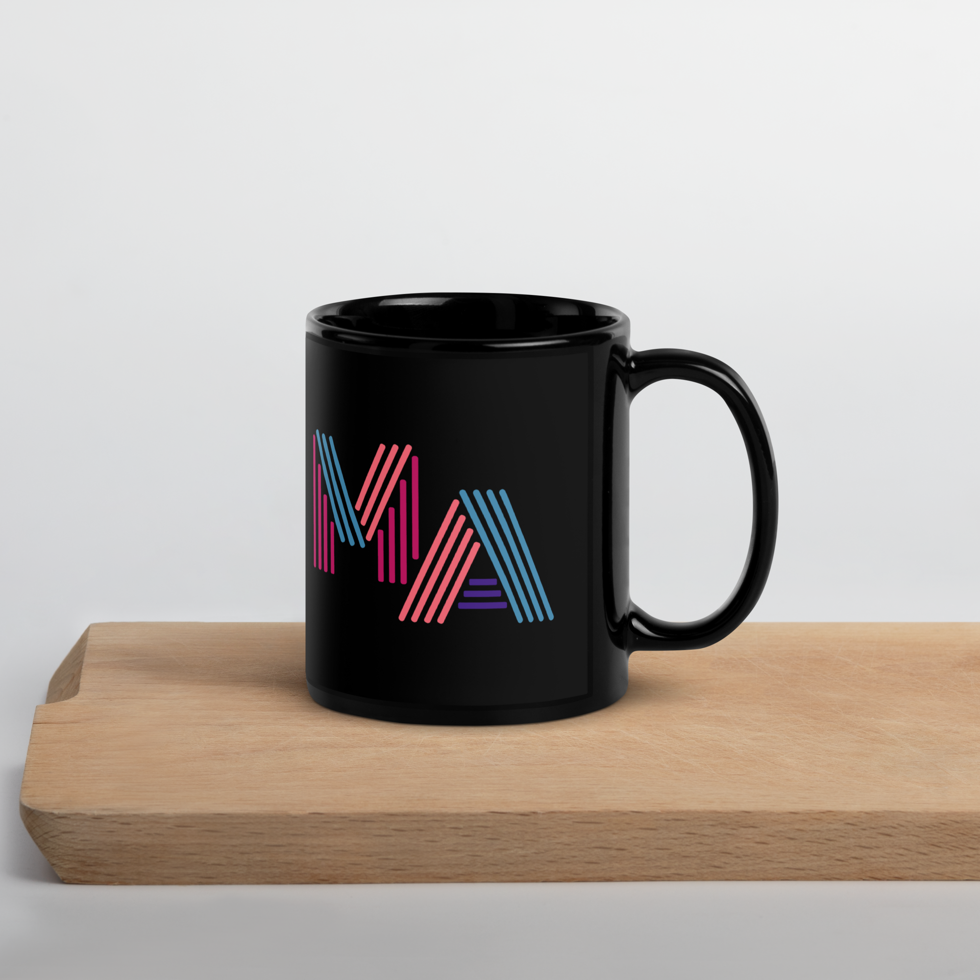 MA massachusetts in neon 90s style lettering on black glossy ceramic mug