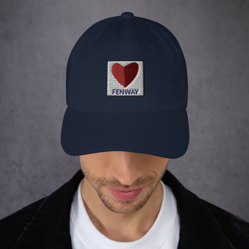 photo of man wearing graphic of the citgo sign boston fenway as a heart embroidered on baseball hat