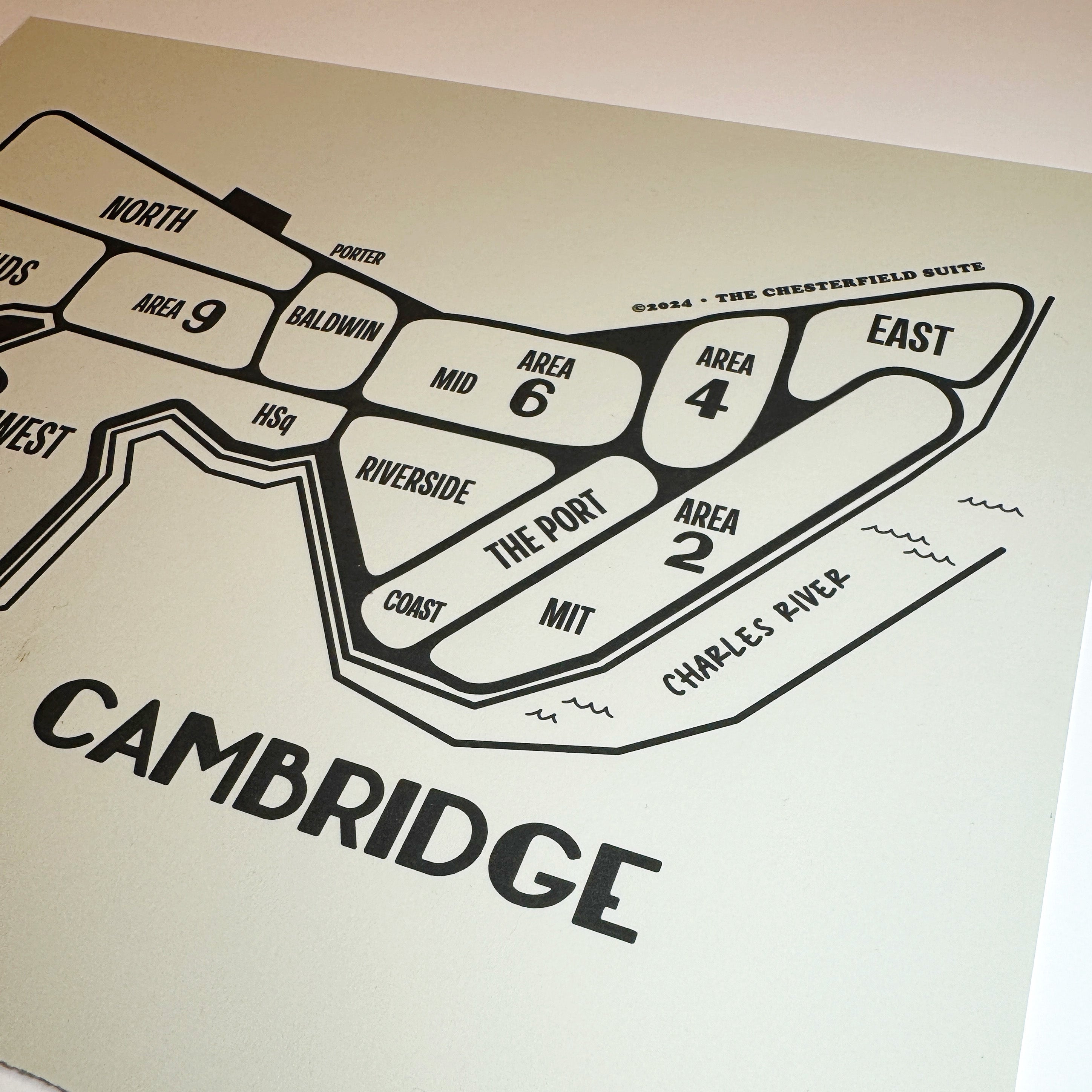 close up of hand drawn design of the cambridge massachusetts map with dark grey lines and artwork