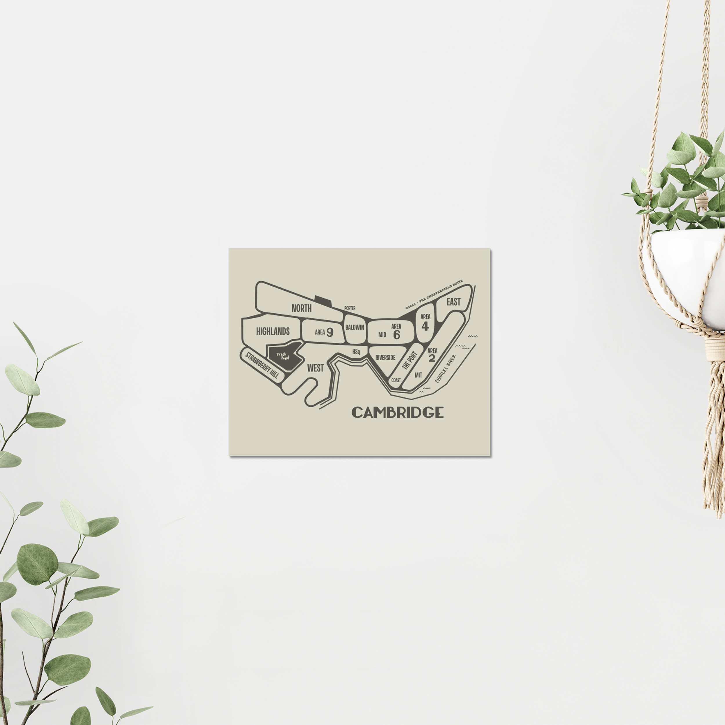 hand drawn design of the cambridge massachusetts map with dark grey lines and artwork on a wall