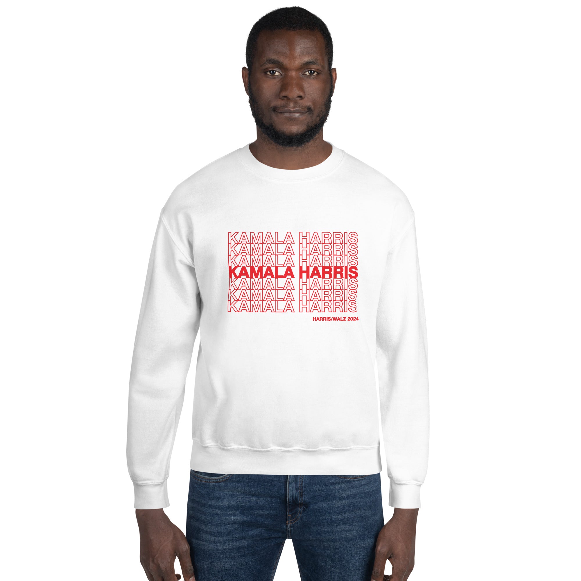 man wearing White unisex crewneck sweatshirt with red text saying "kamala Harris" in the classic plastic shopping bag design