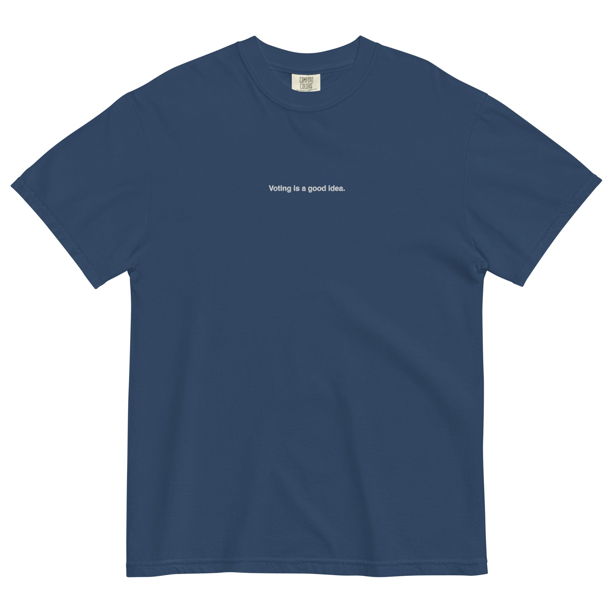 navy heavyweight unisex t-shirt with the phrase, voting is a good idea, embroidered in white on the front