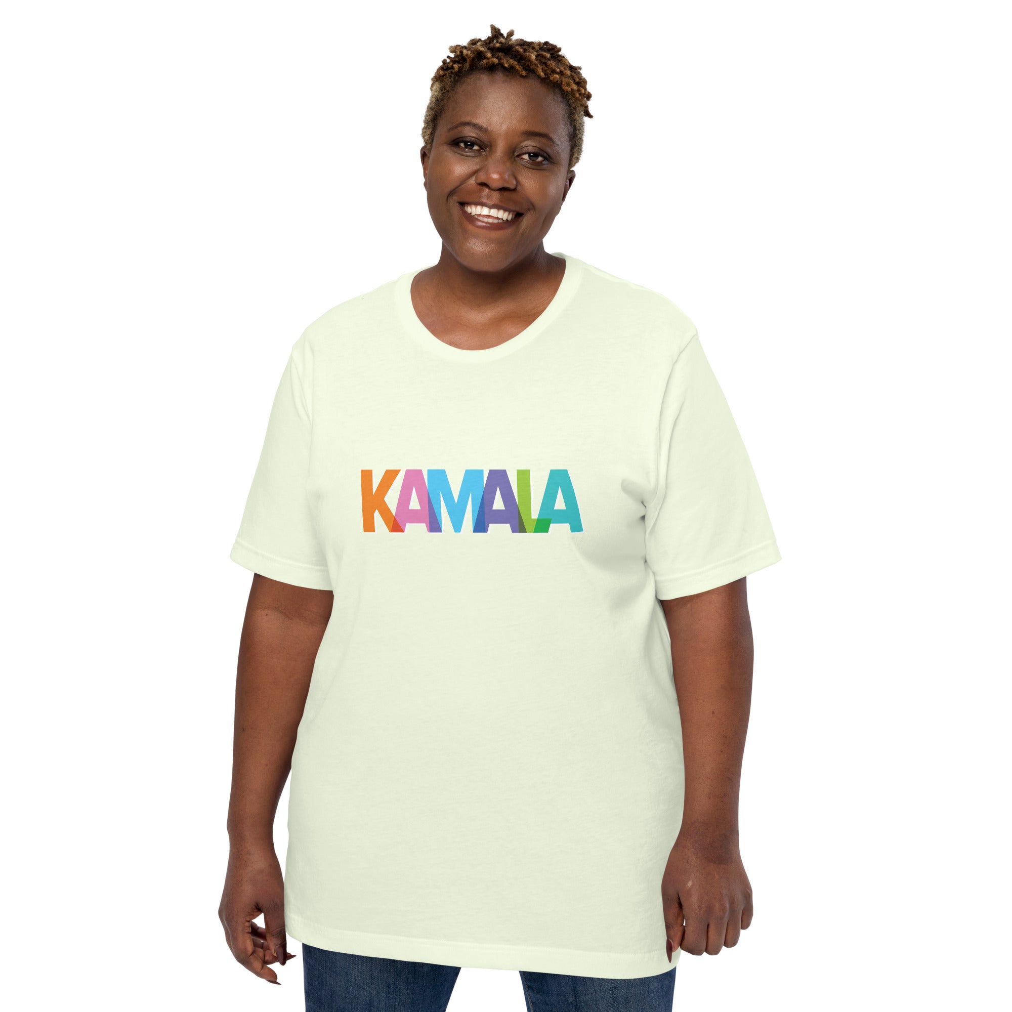 woman wearing citron colored unisex t-shirt with KAMALA on the front with multi colored overlapping letters