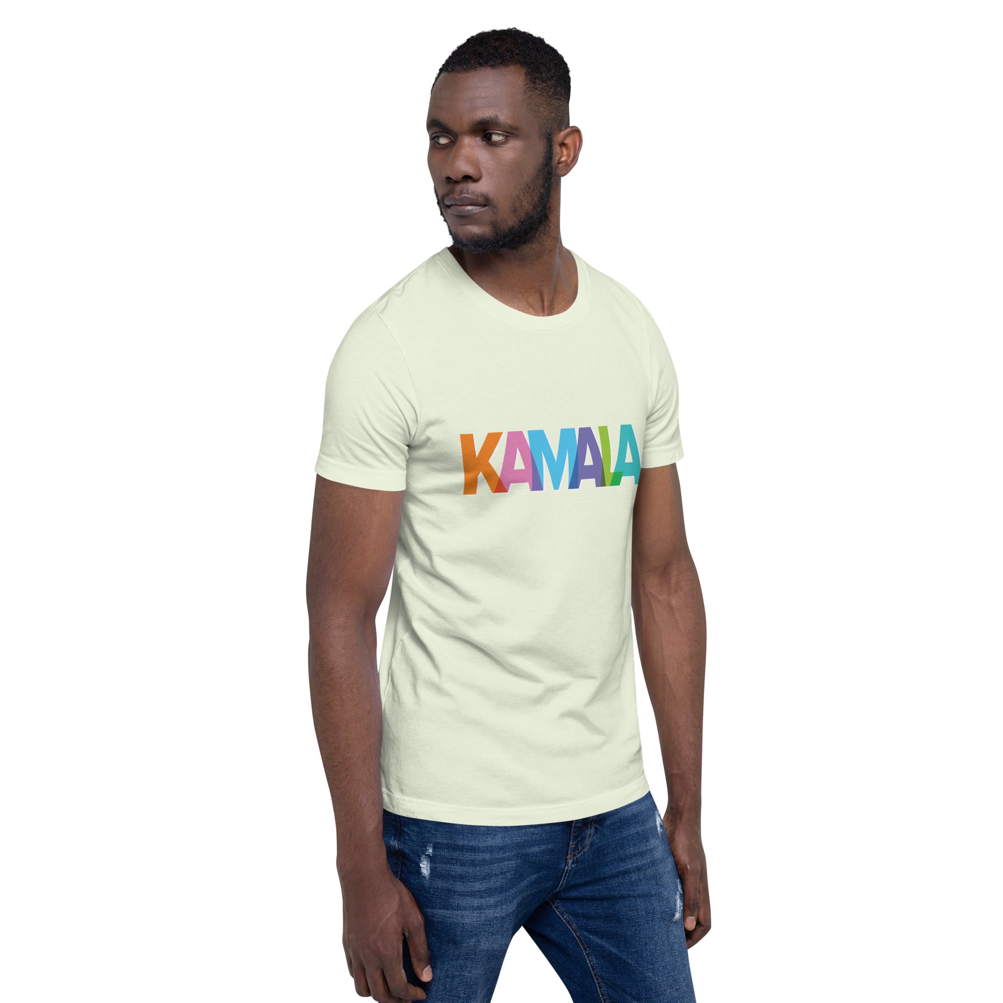 man wearing citron colored unisex t-shirt with KAMALA on the front with multi colored overlapping letters