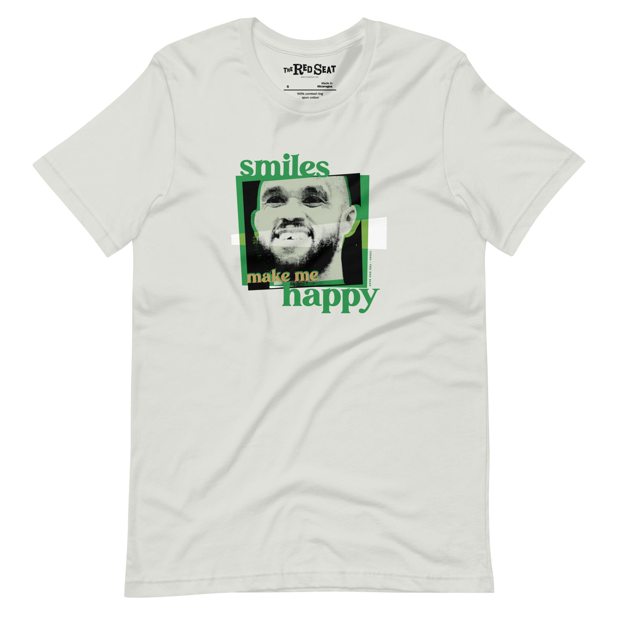 silver grey shirt with boston celtics derrick white smiling with a chipped tooth