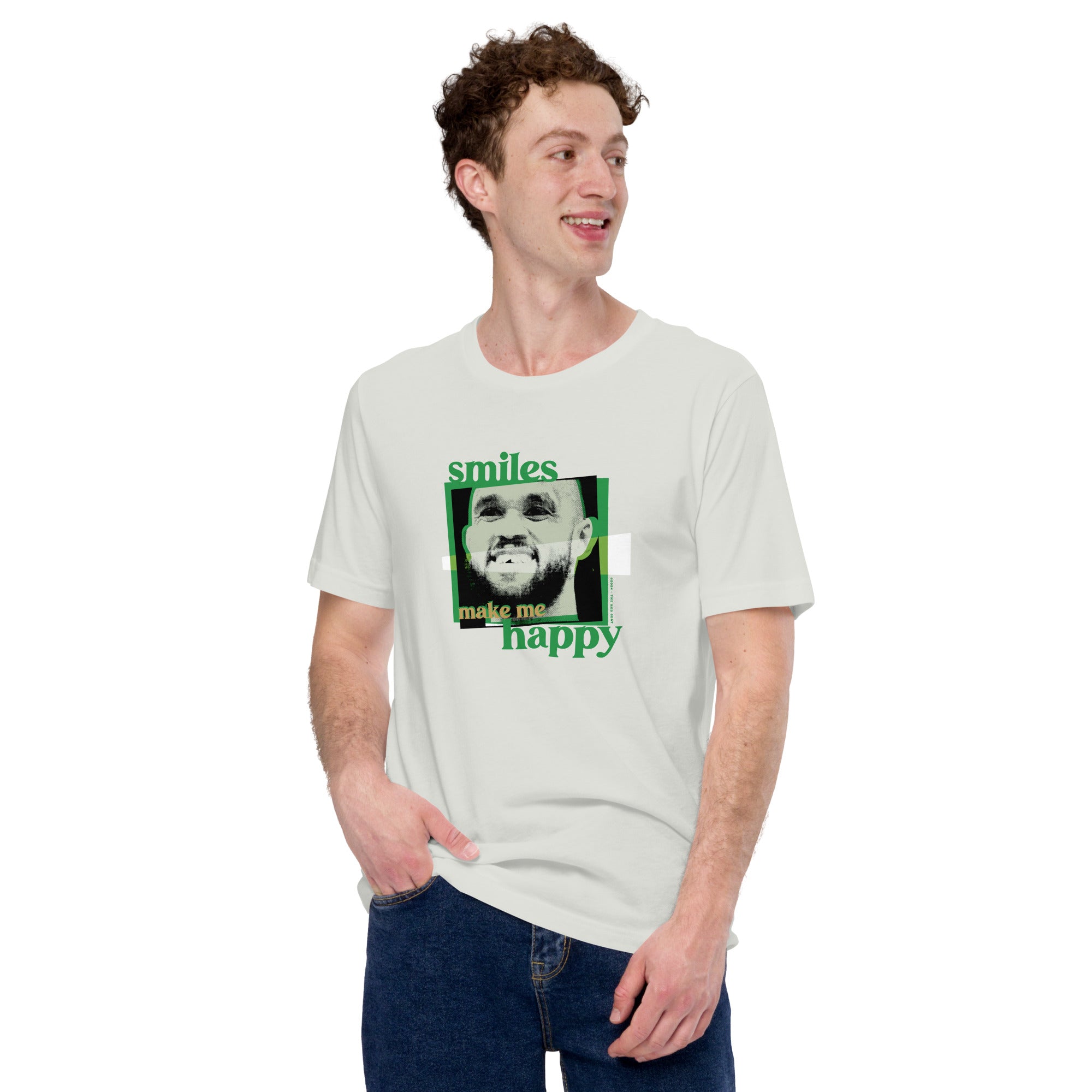 man wearing silver grey shirt with boston celtics derrick white smiling with a chipped tooth