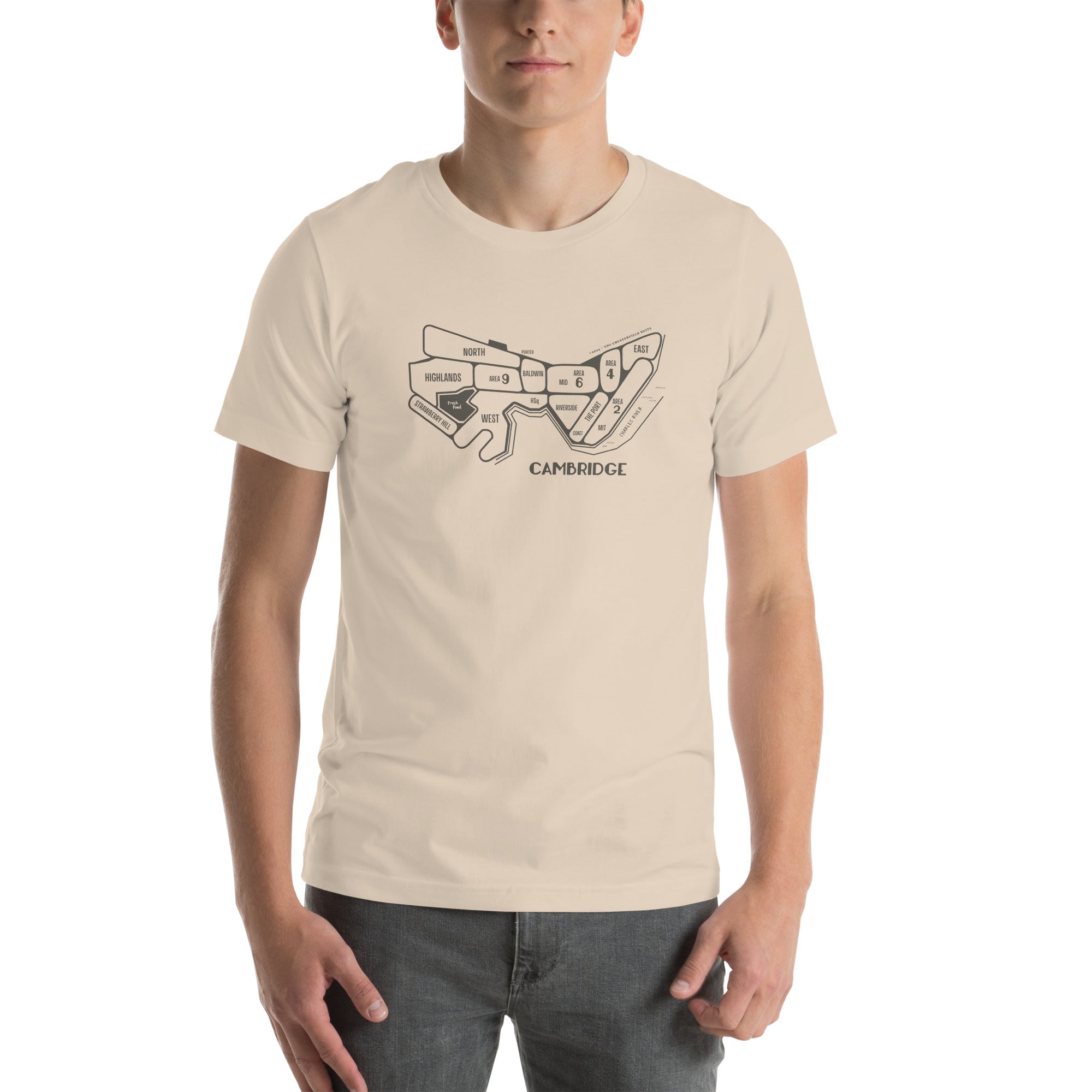 man wearing cream, tan unisex t-shirt with a hand drawn map of cambridge, ma in dark grey