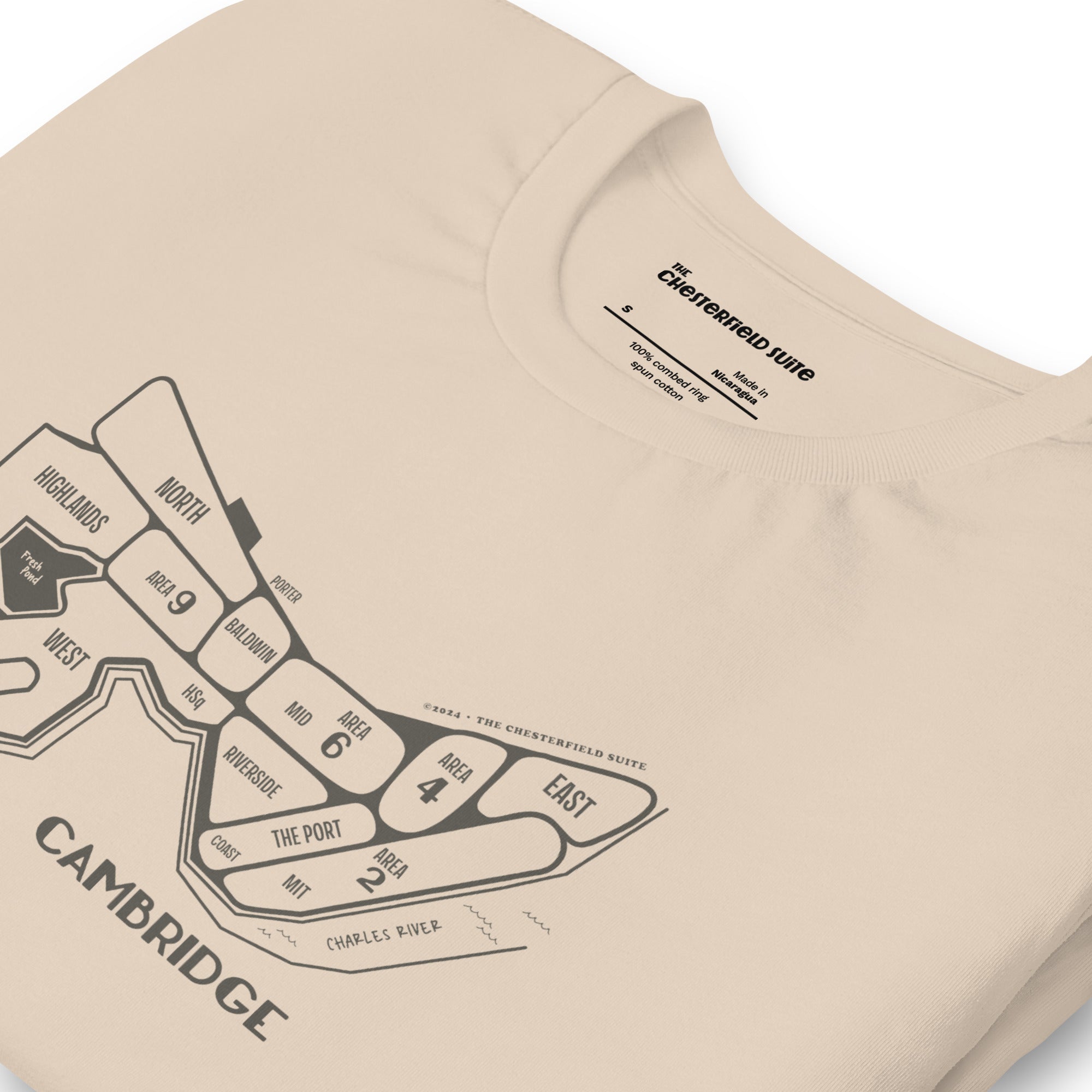 cream, tan unisex t-shirt with a hand drawn map of cambridge, ma in dark grey