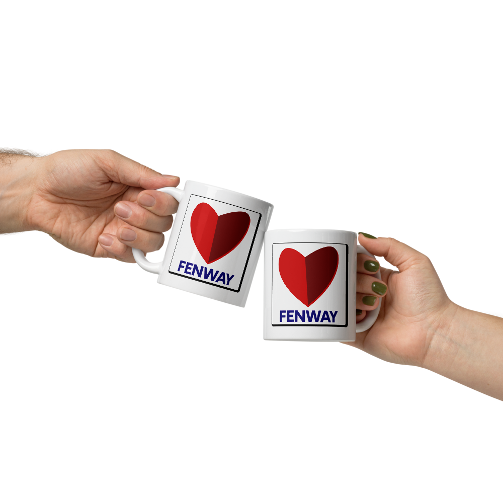 photo of 2 people holding white ceramic mugs with the word fenway and the citgo sign as a heart