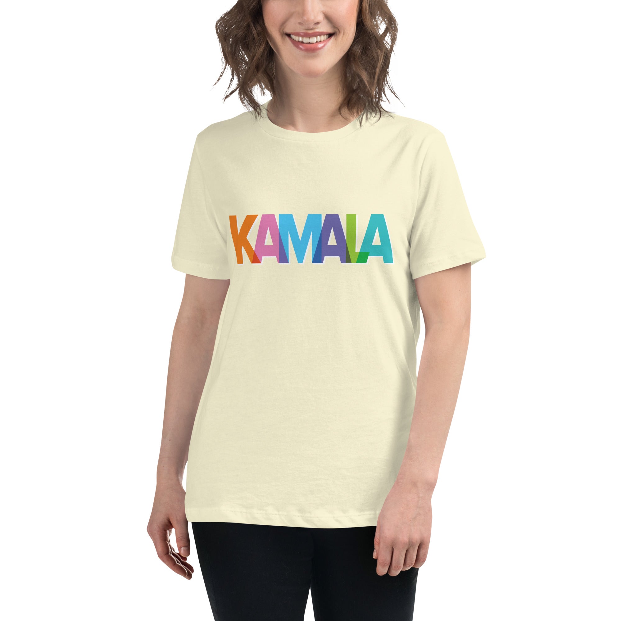 woman wearing citron colored women's t-shirt with KAMALA on the front with multi colored overlapping letters