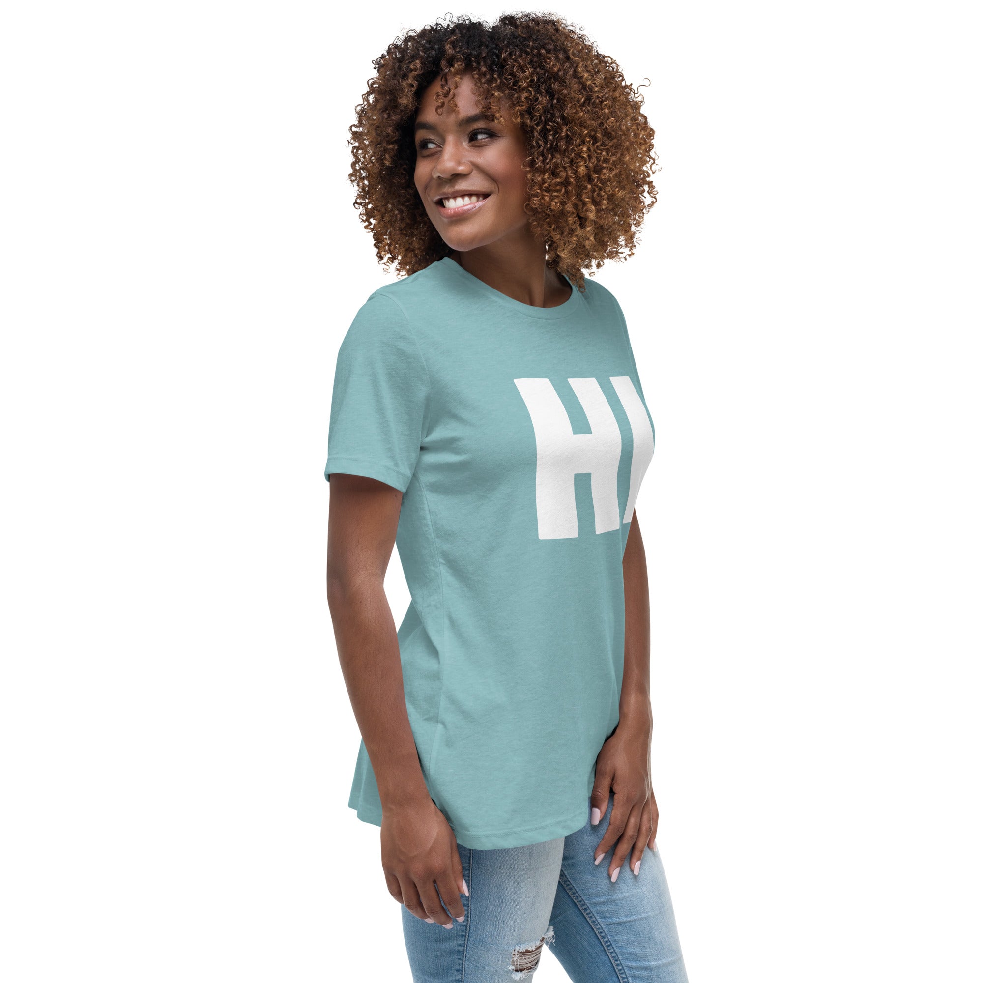 photo of a woman wearing the word HI in white on a light blue women's t-shirt