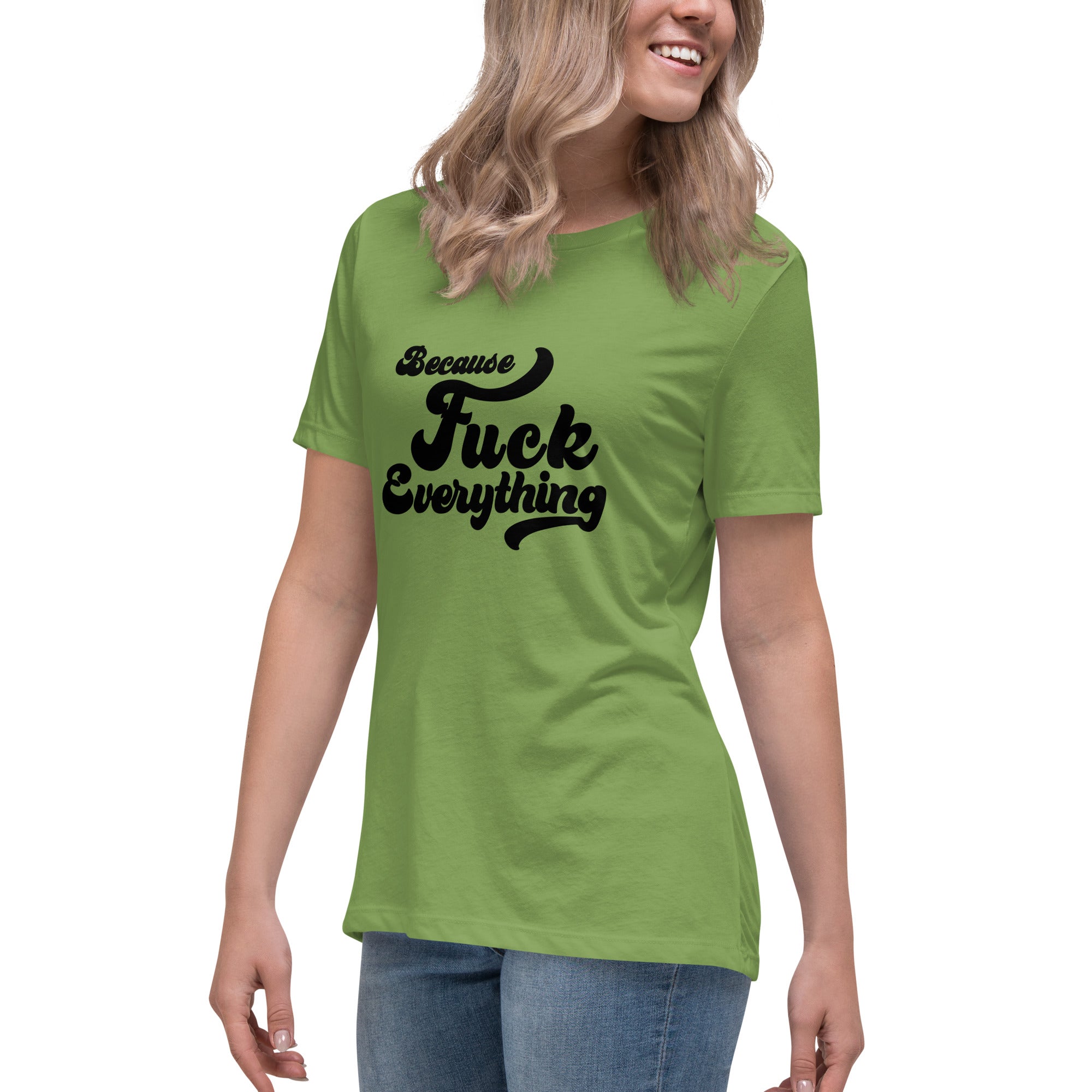woman wearing green womens shirt with the words Because Fuck Everything written on the front in black cursive font