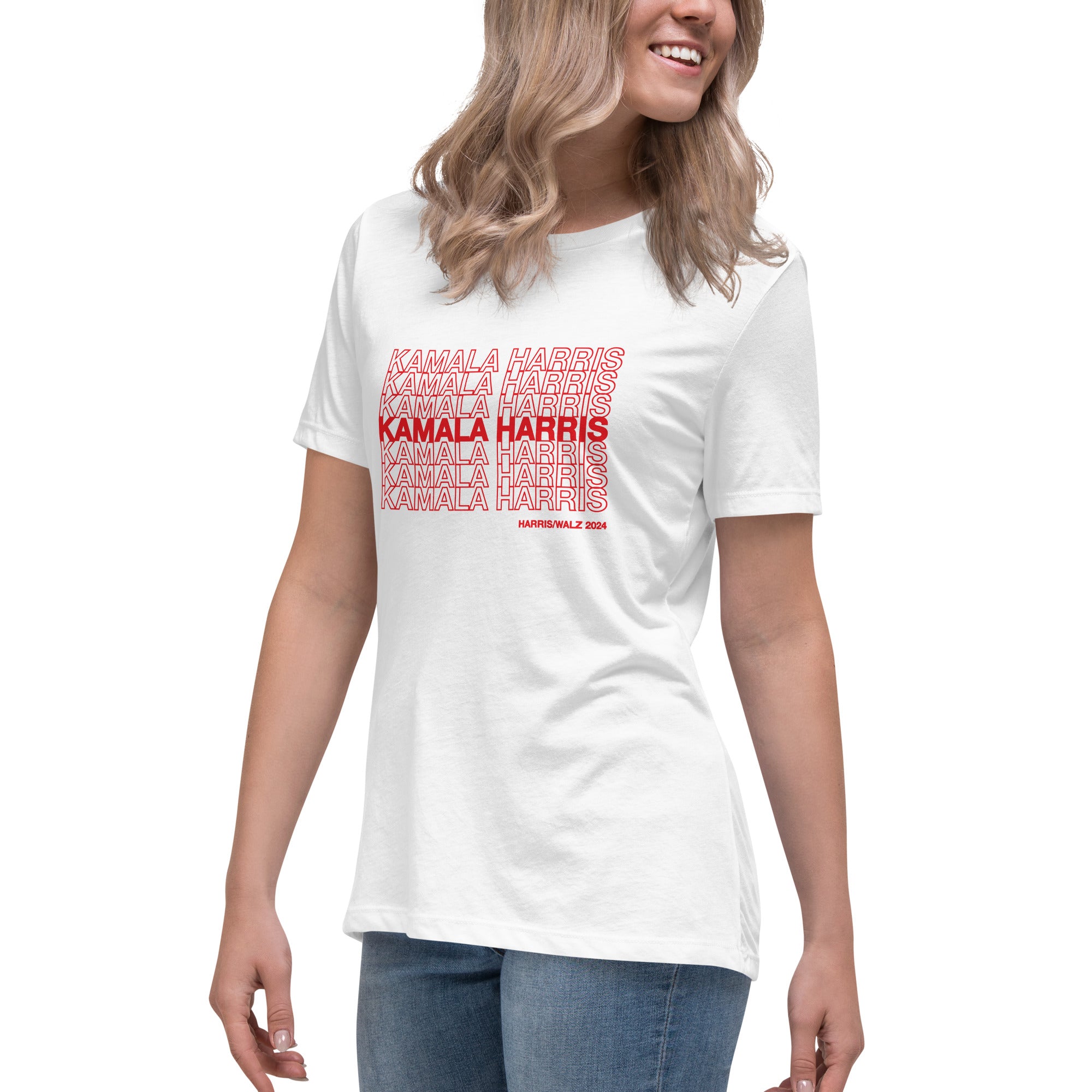 woman wearing White women's t-shirt with red text saying "kamala Harris" in the classic plastic shopping bag design