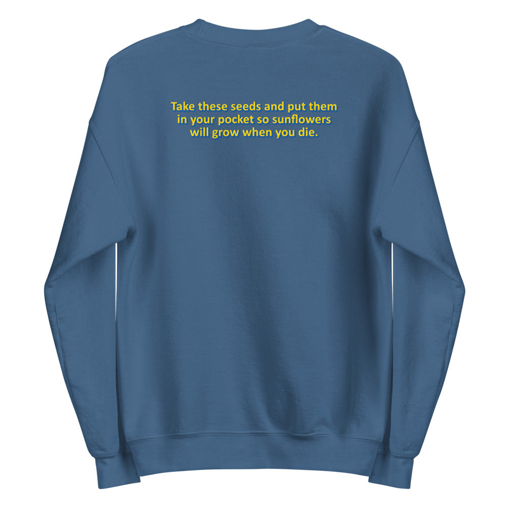 back of crewneck blue sweatshirt on design by the chesterfield suite of a sunflower with the phrase Take these seeds and put them in your pocket so sunflowers will grow when you die 